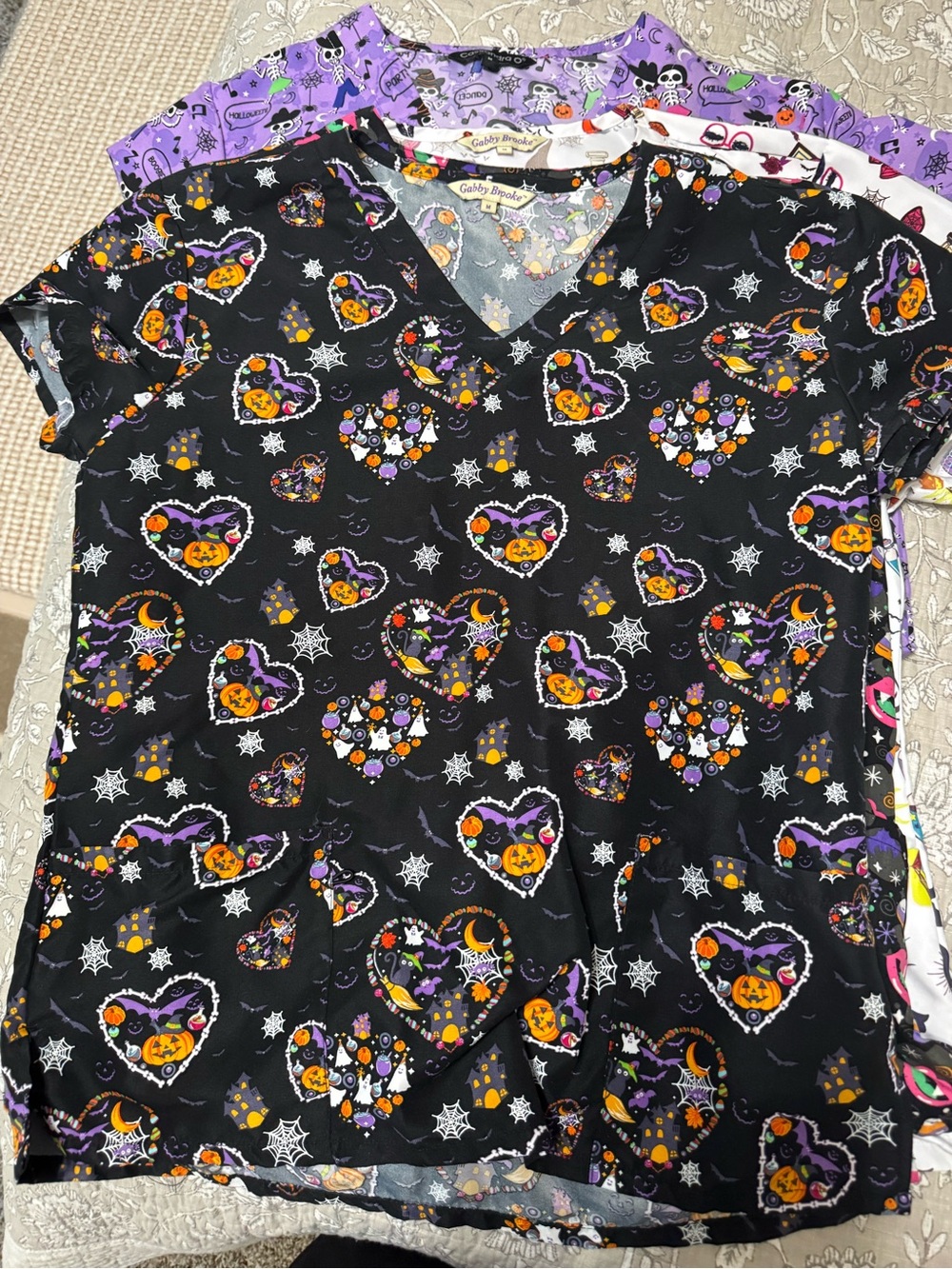 Halloween scrub tops set of four.